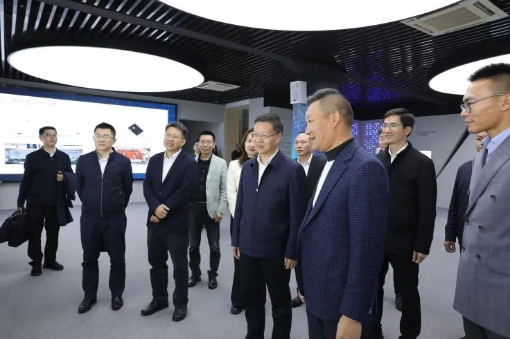 防城港市委書記譚丕創走訪太洋科技